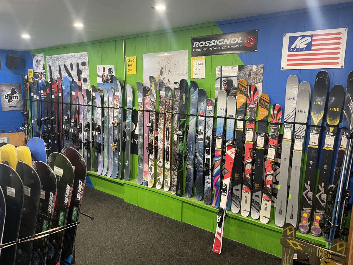 Skis and snowboards in a shop